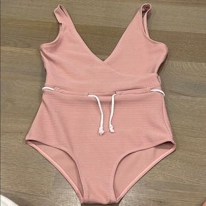 Light pink swimsuit with rope belt